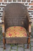 Lloyd Loom chair with oak arm supports