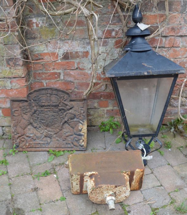 Cast iron toilet cistern, metal street lamp & a cast iron fire back plate