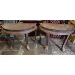 Pair of distressed Oriental demi-lune tables