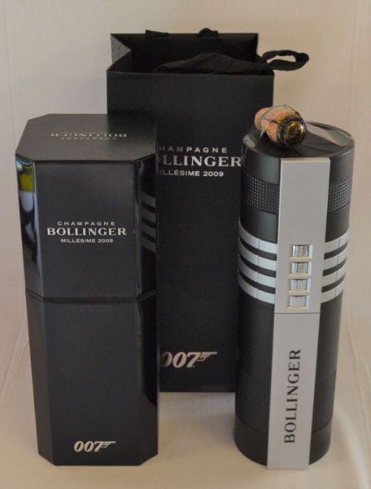 2 Bollinger 007 James Bond Champagne caskets with empty bottles & a bag