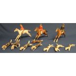 Early 20th century carved  & painted wooden hunting set comprising three horses and riders, 1