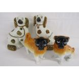 2 Staffordshire style black faced pug dogs and 2 small fireside spaniels approx. 24cm tall