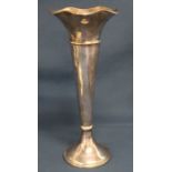 Silver vase with wavy rim & loaded base, London 1919, inscribed on base, 32cm tall