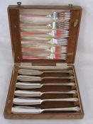 Cased fish knife and fork set and silver plated boiled egg cruet for six