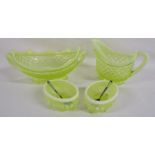 Yellow vaseline glass jug, oval dish, 2 salts with enamelled spoons