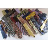 Collection of approx. 50 silk ties includes an Yves St Laurent, Thai silk, Italian Silk, Laurent