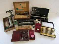 Collection of watchmakers tools:- Cooke Troughton & Simms precision level E095465, Presto tap set,