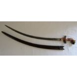 Sabre with tigers head handle and leather scabbard - blade measures approx. 74cm