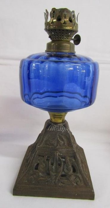 Wooden 1930's table lamp with cast girl holding a ball, cast metal oil lamp with blue glass - Image 3 of 5
