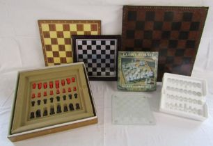 Collection of chess boards includes glass with pieces, RC creations board with pieces and large