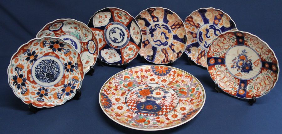 6 Imari pattern porcelain plates (some chips) & large plate