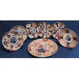 6 Imari pattern porcelain plates (some chips) & large plate
