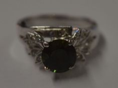 White gold ring, possibly 14kt with central peridot and diamonds, total weight 4g, size L/M