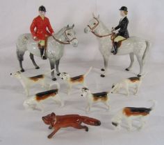 Beswick hunting scene includes huntsman on dapple horse, huntswoman on dapple horse, 6 hounds and