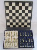 Marble chess pieces with marble covered board