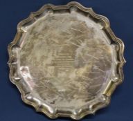 Large silver tray on four hoof feet, with central inscription and engraved signatures, Mappin & Webb