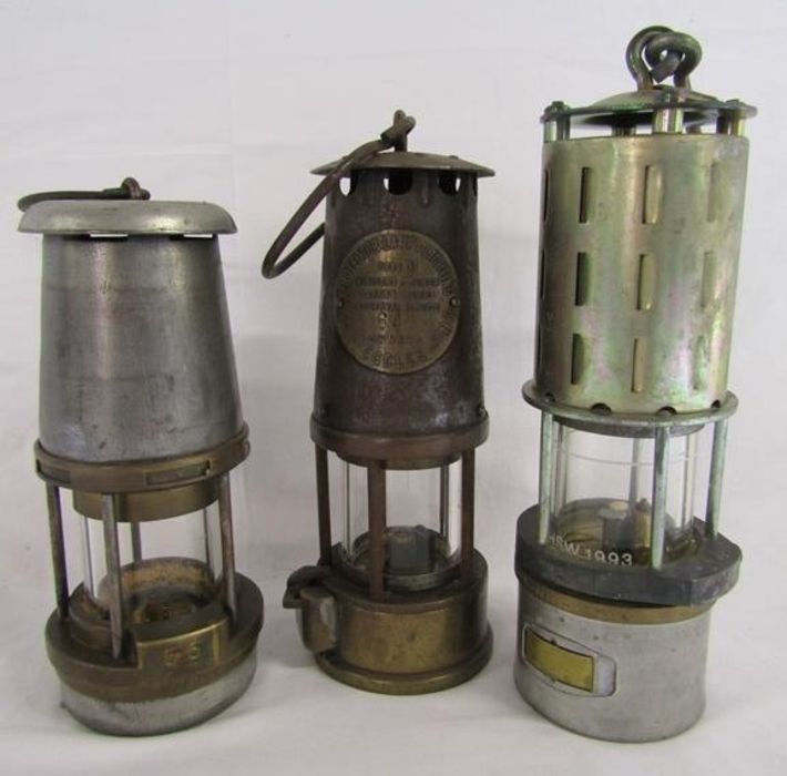 Wolf type FS 55 lamp, The Protector Lamp and Lighting Company Eccles SL lamp and one other marked