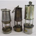 Wolf type FS 55 lamp, The Protector Lamp and Lighting Company Eccles SL lamp and one other marked