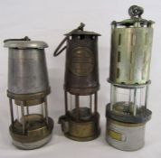 Wolf type FS 55 lamp, The Protector Lamp and Lighting Company Eccles SL lamp and one other marked