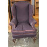 19th century wing chair on carved cabriole legs