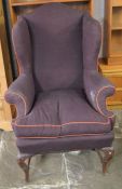 19th century wing chair on carved cabriole legs