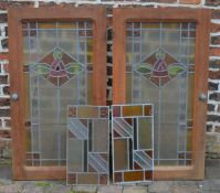 Pair of lead stained glass doors (111cm by 61cm) & a pair of stained glass panels (52cm by 27cm)
