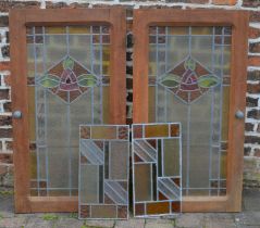 Pair of lead stained glass doors (111cm by 61cm) & a pair of stained glass panels (52cm by 27cm)