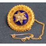 Victorian target brooch with central diamond set star in blue enamel (tested as 15ct gold) 6.8g -
