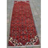 Red ground full pile Persian Hamadan runner 2.6m by 0.8m