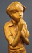 Art Deco c1930 gilt metal figure of whistling female in a cap on onyx socle base 31cm high