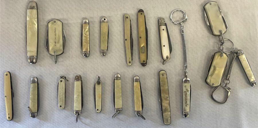 Selection of miniature pocket pen knives, some with key rings