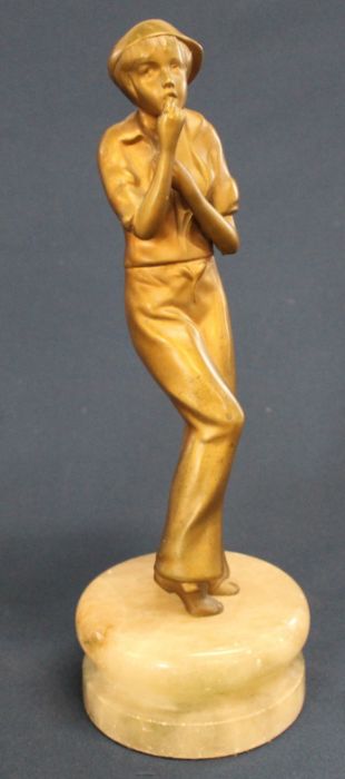 Art Deco c1930 gilt metal figure of whistling female in a cap on onyx socle base 31cm high - Image 2 of 3