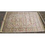 Ivory ground full pile cashmere rug with all over floral pattern 170cm by 120cm