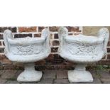 Pair of large concrete decorative two handled urns