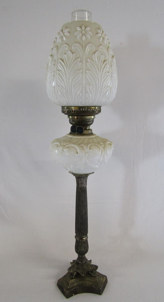 Duplex oil lamp with white glass reservoir and shade heavily tarnished silver plate stem and brass