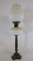 Duplex oil lamp with white glass reservoir and shade heavily tarnished silver plate stem and brass