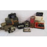 Collection of cameras includes Minolta, Brownie 44A, Instamatic, Ambassador, Mintax, Clip Sonic etc