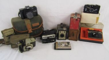 Collection of cameras includes Minolta, Brownie 44A, Instamatic, Ambassador, Mintax, Clip Sonic etc