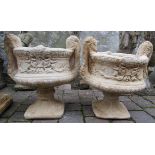 Pair of concrete twin handled urns