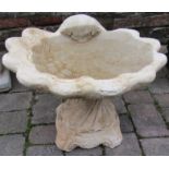 Concrete shell bird bath