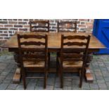 Heavily carved reproduction Jacobean refectory table in oak (168cm x 90cm Ht76cm) with 4 rush seated