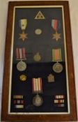 Framed group of 4 World War II medals including The Atlantic Star with rosette, Mine Sweeping 1945-