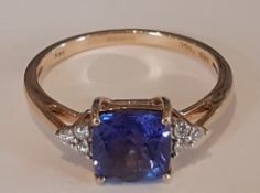 14ct gold tanzanite ring set with diamond shoulders, size O, 2.3g