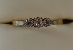 9ct gold & platinum ring with 3 small illusion set diamonds size P 1.3g