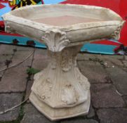 Concrete Gothic style bird bath with hexagonal top