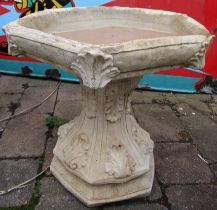 Concrete Gothic style bird bath with hexagonal top