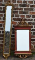 Two ornate wall mirrors