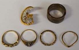 Four 9ct gold rings, including eternity ring inset with red stones possibly garnet (broken), 4 stone