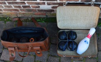 10 Lawn bowls, a baseball and a WIBC ABC American bowling pin, with two bags and suitcase, including