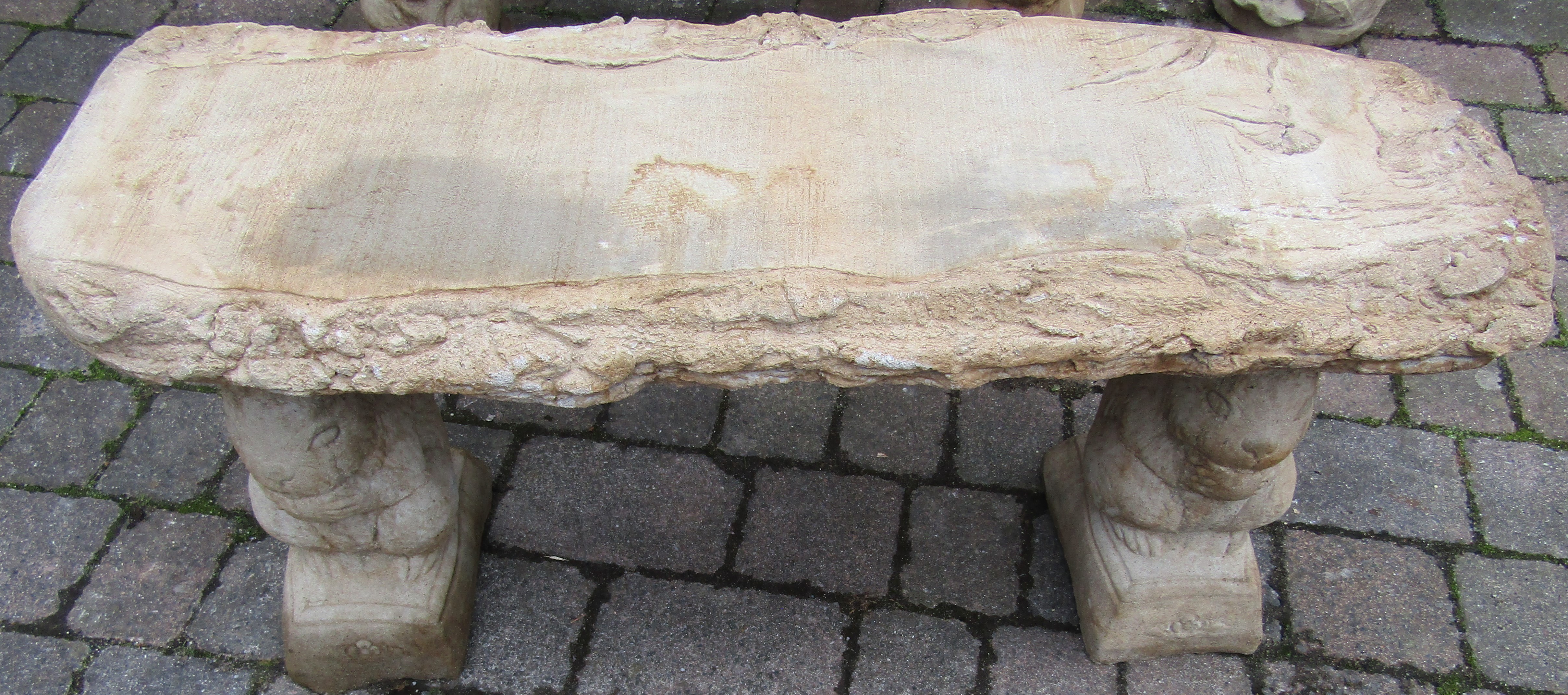 Concrete timber effect garden seat with squirrel plinths